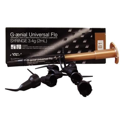 Dental composite syringe labeled 'G-aenial Universal Flo' with dispensing tips and a black packaging box.