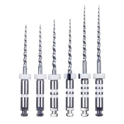 Six dental endodontic files arranged in a row, with twisted tips and metal handles used for root canal work.