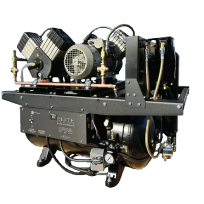 Industrial air compressor unit mounted on a metal frame with belts, gauges, and hoses.