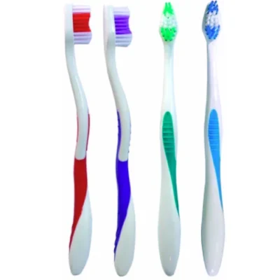 Set of four toothbrushes with different colored bristles and handles arranged side by side on a white background